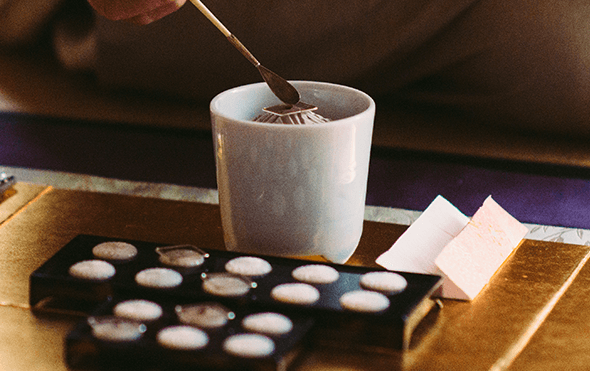 2.A piece of aromatic wood gets put into an Incense burner