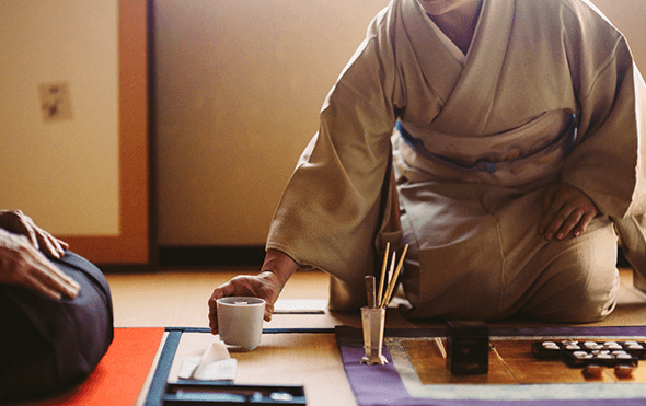 3.Incense burners are passed to ceremony guests